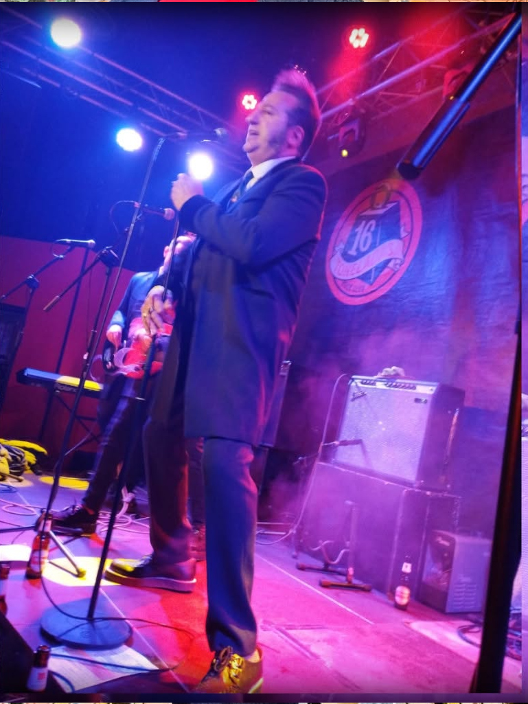 Santi Plata performing in custom made creepers